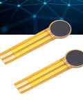 Two FLEXMAN thin-film pressure sensors on flexible yellow film with circular dark sensing pads