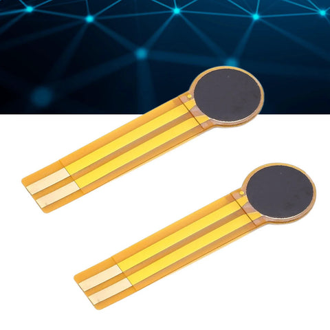 Two FLEXMAN thin-film pressure sensors on flexible yellow film with circular dark sensing pads
