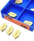 Super Tough 10 Pack Carbide Turning Inserts For Lathe SP200 PC9030 in a blue case with four NC3020 inserts visible.