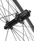 Close-up of 11-speed hub on 700C Carbon Wheelset With 45mm Deep Rim For Road Bikes, Rim Brake, Quick Release QR 9X100 front