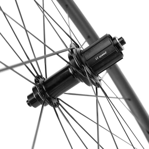 Close-up of 11-speed hub on 700C Carbon Wheelset With 45mm Deep Rim For Road Bikes, Rim Brake, Quick Release QR 9X100 front