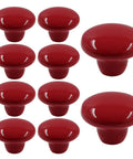 Upgrade Your Home With Fresh Red Ceramic Cabinet Knobs One Point Five Inches Wide Sleek And Slick For Modern Kitchen Drawers featuring ten shiny red ceramic knobs.