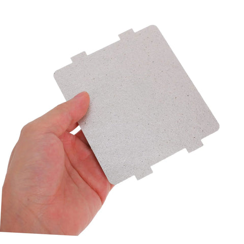 Person holding a High Temperature Mica Sheet for Microwave Ovens Heat Shield and Insulation Cover Replacement Parts for Kitchen Home Repair.