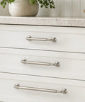 10 Pack Zinc Alloy Offset Curved Drawer Pulls 6.3 Inch Brushed Nickel Cylindrical Cabinet Handles on white drawers