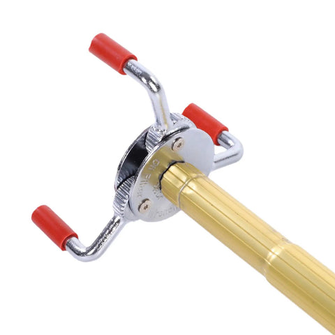 Heavy Duty Smoke Detector Removal Tool With 17 Point Four Foot Telescoping Extension Pole For Vaulted Ceilings And High Walls - close-up view of the chrome and gold tool head.