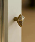 Antique Bronze Cabinet Knobs And Drawer Pulls Two Pack With Boho Geometric Silhouettes on white cabinet door