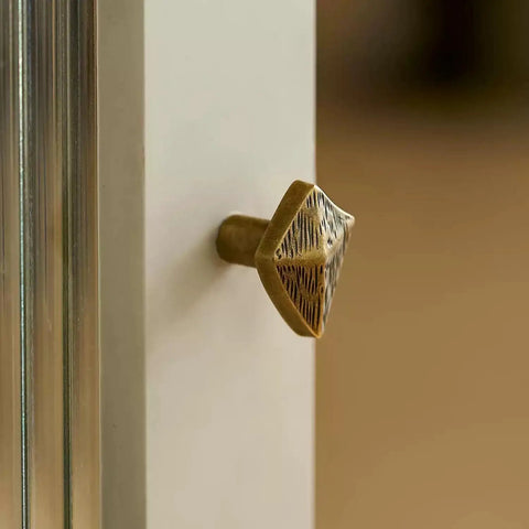 Antique Bronze Cabinet Knobs And Drawer Pulls Two Pack With Boho Geometric Silhouettes on white cabinet door