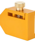Brass Ruler Positioning Adjuster for Woodworking, locks steel rulers up to 30mm by 2mm, side view, precise layout tool.
