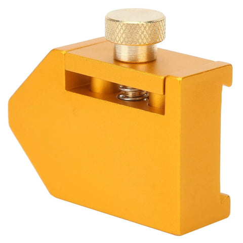 Brass Ruler Positioning Adjuster for Woodworking, locks steel rulers up to 30mm by 2mm, side view, precise layout tool.