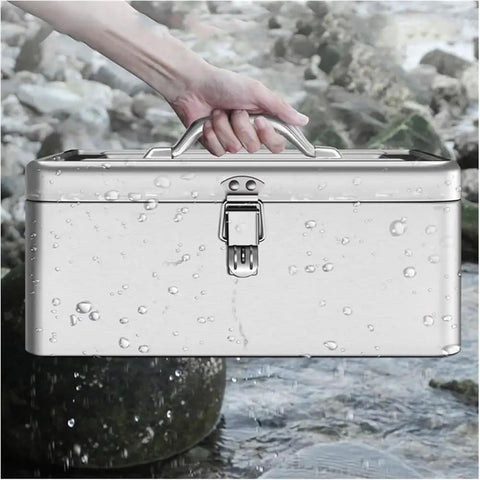Hand holding Sturdy Portable Stainless Steel Tool Box With Metal Latch over wet rocks, showcasing water resistance
