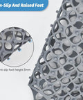 Close-up of heat resistant silicone sink mat for kitchen, two pack 13.8 by 11.4 inches, raised feet design for quick drainage.