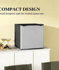Slick Compact Upright Freezer Sweet Countertop Mini Fridge Silver 1.1 Cu Ft Storage on countertop with drinks.