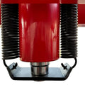 Close-up view of red hydraulic cylinder of 50 Ton Hydraulic Shop Press With H Frame Workhorse Adjustable Working Table Height Twenty Seven And A Half Inch Bed Seven And A Half Inch Stroke One Hundred Ten To One Hundred Twenty Five PSI Air Quarter Inch Inlet Zero To Forty Inch Work Range Garage.