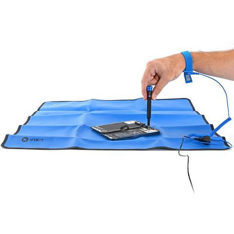 iFixit blue portable anti-static mat with wrist strap and grounding cord for electronics repair