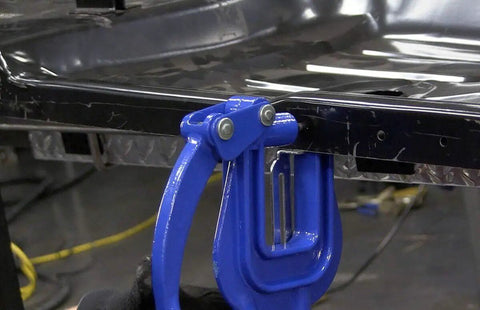 Heavy Duty Hand Punch Kit For Sheet Metal Portable Auto Body Rivet Hole Tool in use on metal sheet