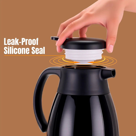 Keep Coffee Hot All Day With This Double Walled Vacuum Insulated Carafe 56 Ounce Thermal Urn With Stainless Steel Interior And BPA Free Exterior Ideal For Home Or Office No Spill Design Easy Pour Spout Black showing leak-proof silicone seal