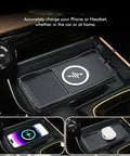 Road Ready Wireless Charging Pad With Quick Snap Fit Setup For Gmc Acadia And Hummer Ev Suv Center Console, featuring non-slip surface and power icon.