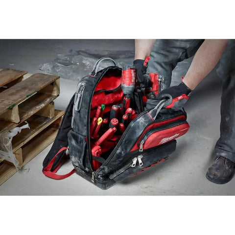 Heavy Duty Canvas Jobsite Backpack With 48 Pockets And Ultra Comfortable Load Bearing Harness, showing tools organized inside.