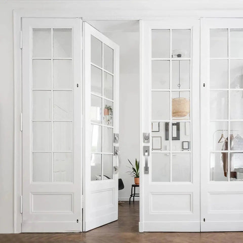 Double Front Door Handle Set With Heavy Duty Lock, Satin Nickel Finish, installed on white glass paneled doors.