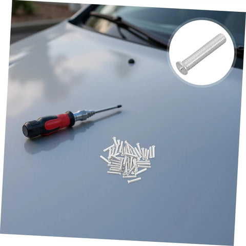 Grab 50 Durable Metal Panel Pulling Studs For Auto Body Work with a red screwdriver on a car hood.