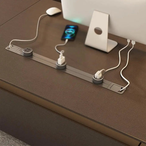 Level Up Your Daily Grind With This Elite Adjustable Standing Computer Desk Premium Executive Boss Table For Home Office Workstation Ergonomic Setup For Power Users And Heavy Lifts with power outlet and cables on a brown desk.