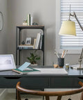 Modern home office with tablet, desk lamp, and organized shelves, ideal setting for Refresh LED Daylight Bulbs For Energy Saving And Bright Colors 40W Equivalent Clear Decorative Candle Light Bulbs With Small Base 4 Pack That Make Your Space Pop In Kitchens And Living Rooms.