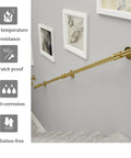 Heavy Duty Gold Wall Mount Staircase Handrail Kit No Sweat Setup Wrought Iron Banister Bracket Set Quick Install on gray wall.