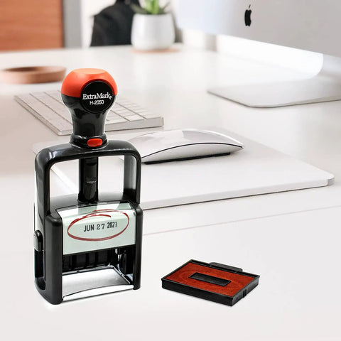 Heavy Duty Self Inking Date Stamp With Sick Brush Stroke Design And Bold Red Ink For Serious Daily Office Hustle That Built Different And Made To Last The Long Haul on a desk with a date showing.