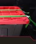 Heavy Duty 27 Gallon Storage Bin 2 Pack Large Plastic Container With Secure Snap On Lid, secured in truck with green straps.