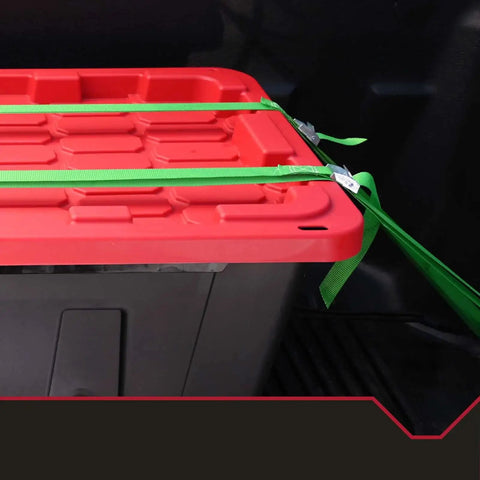 Heavy Duty 27 Gallon Storage Bin 2 Pack Large Plastic Container With Secure Snap On Lid, secured in truck with green straps.