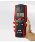 No Sweat Wall Scanner And Stud Finder With Live Wire Detection Wood Metal Detector Featuring LCD Screen in hand.