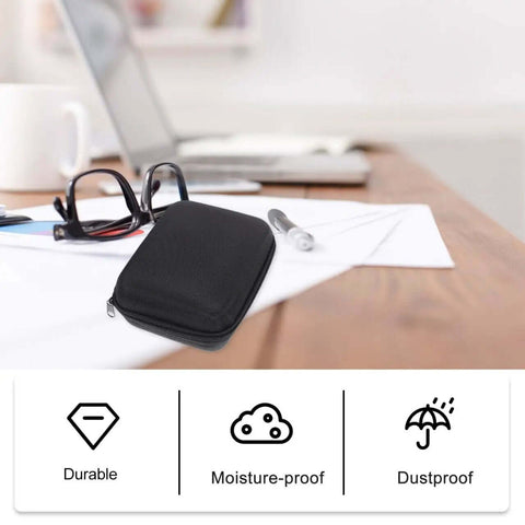 Heavy Duty Hard Shell Tech Carry Pouch For Chargers Power Banks Cables And Earbuds With Water Resistant Cover And Secure Zipper on desk.