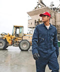 Rugged Men Long Sleeve Coveralls Built Like A Tank With 75 Oz Twill Mechanic Jumpsuit Featuring Zipper Front industrial overalls in a shop setting.