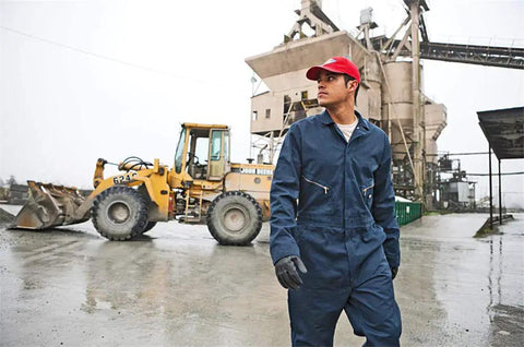 Rugged Men Long Sleeve Coveralls Built Like A Tank With 75 Oz Twill Mechanic Jumpsuit Featuring Zipper Front industrial overalls in a shop setting.