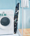 Foldable 47 Inch Bath Tub With Pillow And Bath Seat Wide Portable Spa Tub stored compactly next to washing machine
