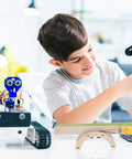 Child assembling DIY Electric Conveyor Belt Kit For Kids Hands On STEM Learning, 2 Piece Educational Model For Preschool And Classroom Use