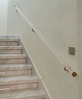 Clear Acrylic Stair Handrail With Heavy Duty Gold Brackets Wall Mount Grab Bar Non Slip Security Support on marble steps.