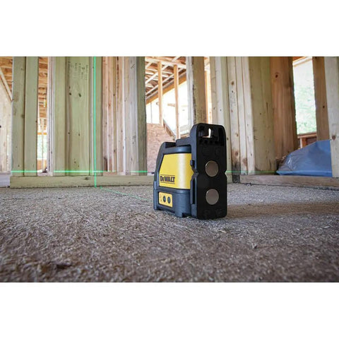 Cross Line Laser Level With Green Beam Pro Grade Durable Overmolded Housing 1 Meter Drop Rating Magnetic Bracket Full Time Pulse Mode Ideal For Picture Hanging And DIY Renovations in a construction site