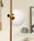 Equinox LED Wall Sconce Indoor Plug In Light For Bedroom And Bathroom With Glass Globe Shades Gold Finish Close-up
