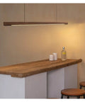 Modern Wood LED Pendant Lights Minimalist Wooden Hanglamp for Bedroom Dining Room Study Office Bar Luminaire Suspension on wooden bar.