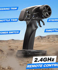 Black 2.4 GHz remote control in desert setting for Rad 1 To 16 Scale RC Car For Adults And Kids 4x4 All Terrain Off Road Truck.