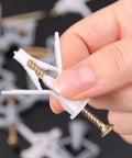 Hand holding Airplane Butterfly Gypsum Board Expansion Screws Kit For Hollow Walls And Plasterboard Nylon And Stainless Steel Self Drilling Fixings For Hanging Curtains Lights Frames And Decor