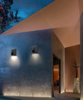 Outdoor Wall Light 8W LED Waterproof Sconce on modern house exterior, illuminating doorway with warm glow, black finish, weatherproof.