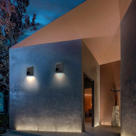 Outdoor Wall Light 8W LED Waterproof Sconce on modern house exterior, illuminating doorway with warm glow, black finish, weatherproof.