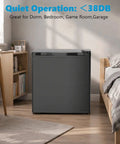 Solid 1.6 Cu Ft Mini Fridge With Dedicated Freezer Knockout Compact Cooler in a cozy bedroom setting.