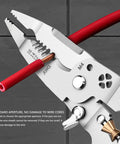 Close-up of Aramox 10-In-1 Folding Wire Stripper Pliers Made Of Crv Steel For Awg 4 To 20, showing wire stripping in action.