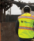 Mens High Visibility Reflective Safety Vest Premium Black Bottom Zipper Ansi Class 2 Construction Utility Workwear Lime Green Large worn at construction site.