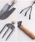 Three Kinds Of Gardening Tools Set Featuring Hooked Mattock Hand Shovel And Trident For Everyday Garden Work And Shoreline Shell Collecting On Tide Flats Built With Iron Heads And Wooden Handles In A Durable Black Finish.