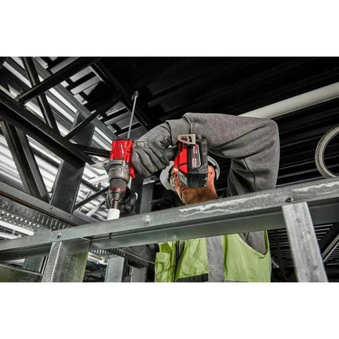 Rugged 18V Brushless Cordless Drill Driver with 1/2 Inch Metal Chuck Featuring Auto Stop being used on metal frame