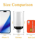 Lit Flame Effect LED Light Bulb With 4 Modes And Gravity Sensor E26 Base Flickering Fire Bulb next to iPhone and card for size